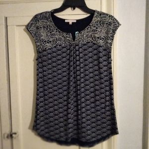 Short sleeve Skies are Blue navy with white detail top. NwT